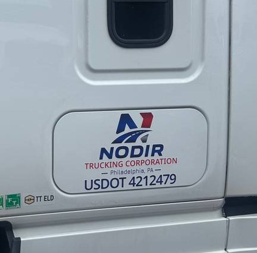 NODIR cab door with the USDOT number