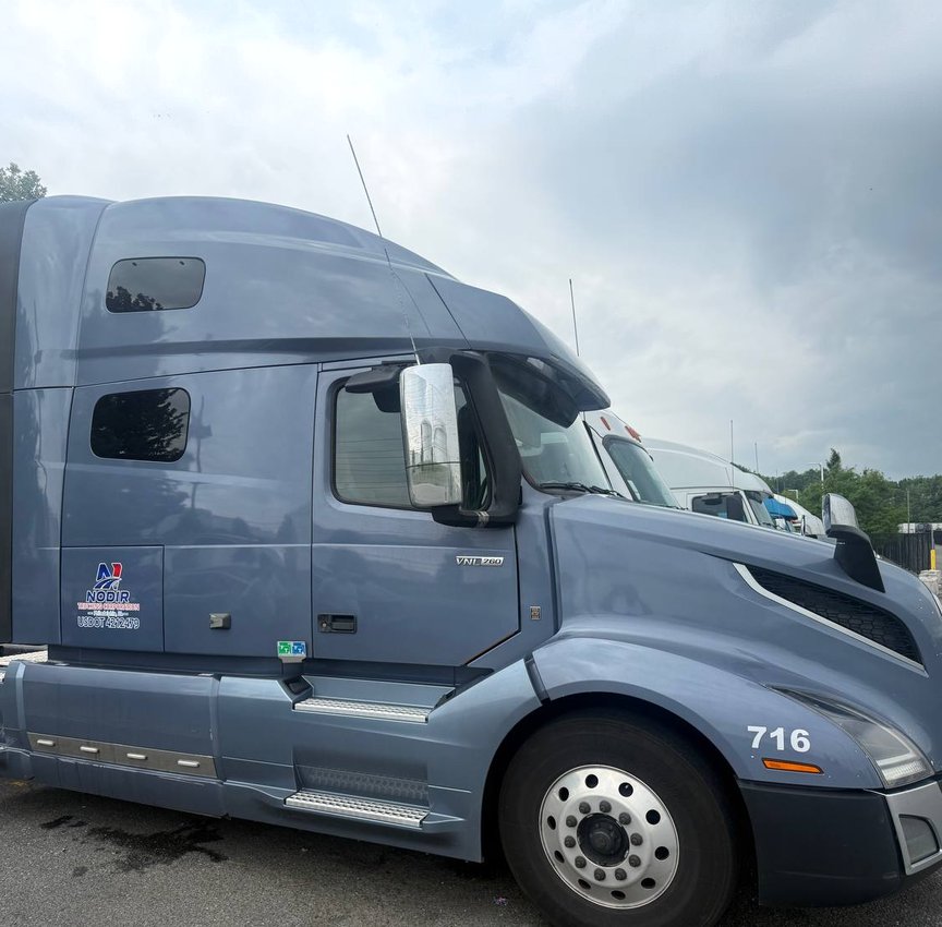 Grey Volvo tractor unit number 716